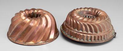 Two copper food molds: both circular