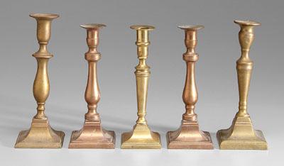 Five brass candlesticks all with 936e1