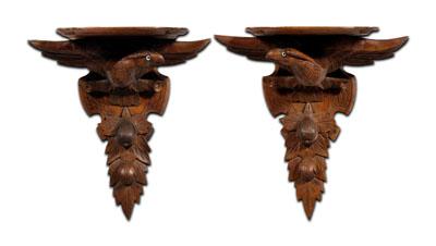Pair eagle-carved brackets: mahogany,
