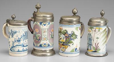 Four Delft tankards all with hinged 93755