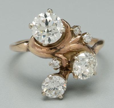 Lady's diamond gold ring, three