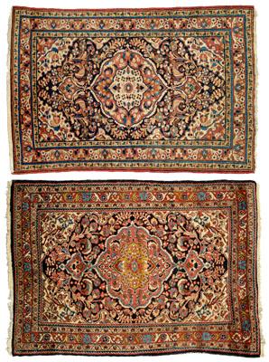 Two similar Dergazine rugs: both