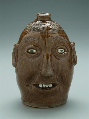 Reggie Meaders face jug runny brown 9390a