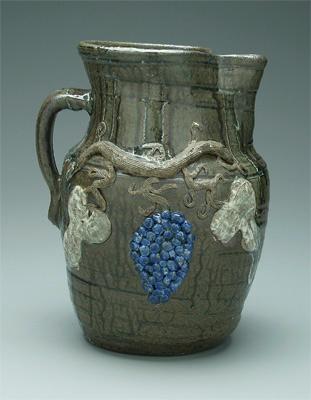 Decorated Hewell stoneware pitcher,