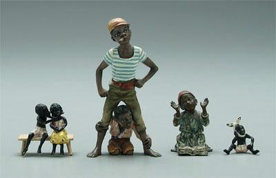 Miniature bronzes, black figures: