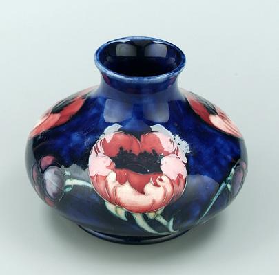 Moorcroft vase, red flowers on cobalt