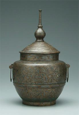 Islamic silver inlaid bronze vessel  93ac7