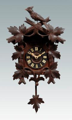 Three weight cuckoo clock, two hinged