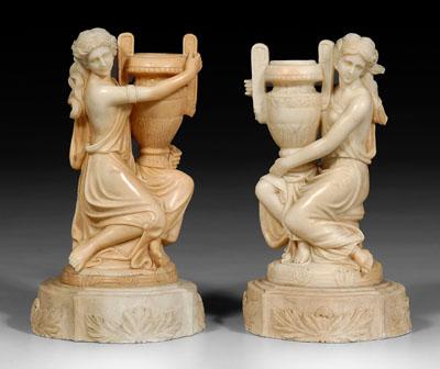Pair of carved marble figural urns: