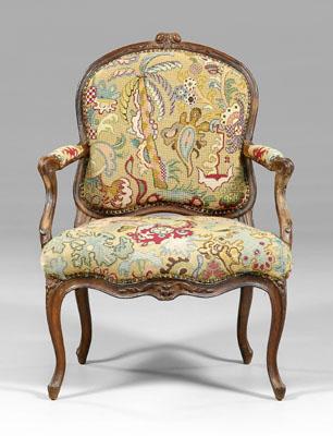 Louis XV carved mahogany fauteuil