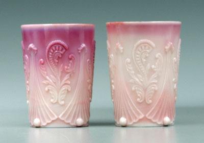 Two pink slag glass tumblers inverted 93e34