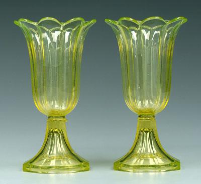 Two yellow glass tulip vases: probably