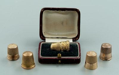 Five gold thimbles: cased 12 kt.