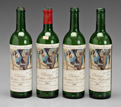 Four Rothschild wine bottles: four