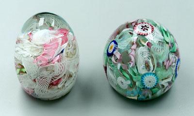 Two latticino paperweights: one