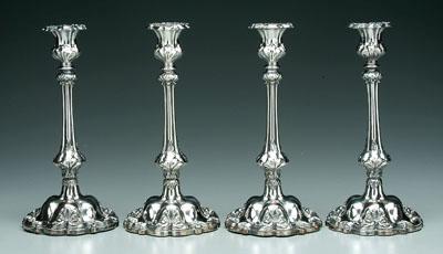 Four silver plated candlesticks  9414b