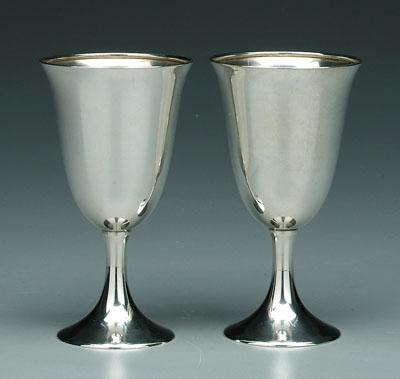 Twelve sterling goblets: flared and