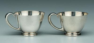 Twelve sterling footed cups: round