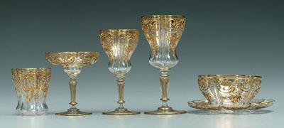 68 pieces gilt decorated glassware: