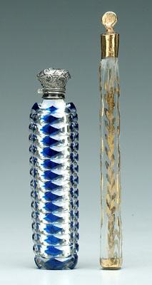 Two glass perfumes: one cobalt