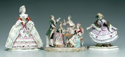Three porcelain figurines: woman