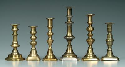 Six push up style brass candlesticks  942fe