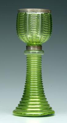 Green glass lamp, stepped circular base,