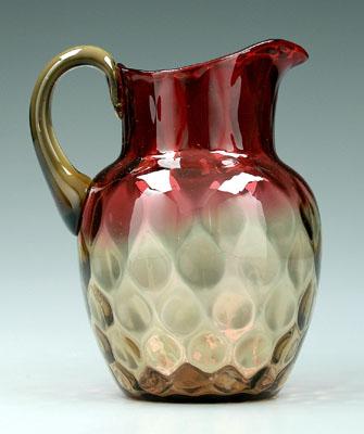 Amberina pitcher, lightly dimpled surface,