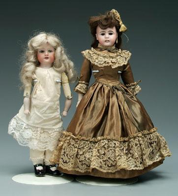 Two bisque head dolls, both with