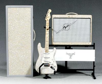 Fender Stratocaster and amplifier: mottled