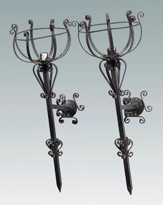 Pair iron wall-mounted torcheres: