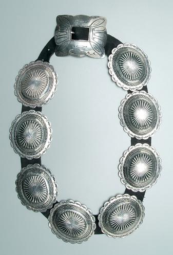 Navajo concha belt, eight silver conchas