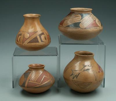 Four Southwestern pots: all with hand