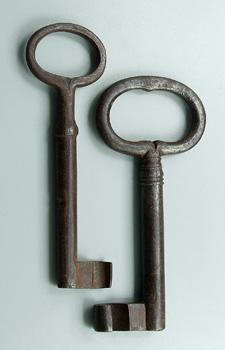 Two muzzle-loading iron key guns: