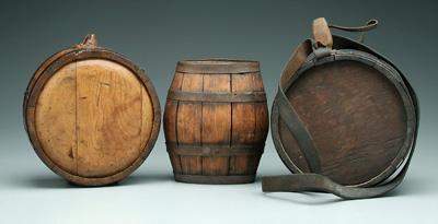 Three wooden canteens: one circular,