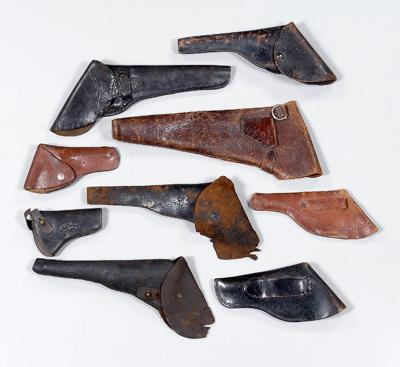 Nine assorted leather flap holsters: