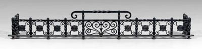 Wrought iron fender, cast and forged