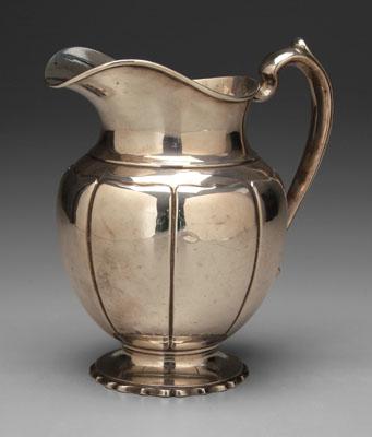 Sterling water pitcher, helmet-form