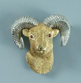 Gold ram&#39;s head brooch, textured
