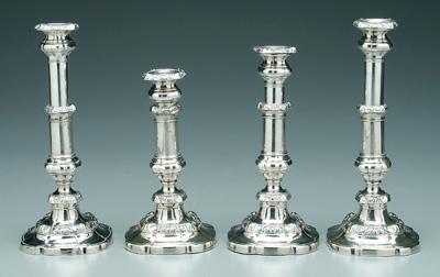 Four telescoping candlesticks: