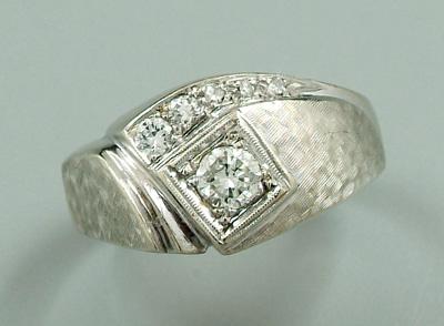Man&#39;s diamond ring, three round