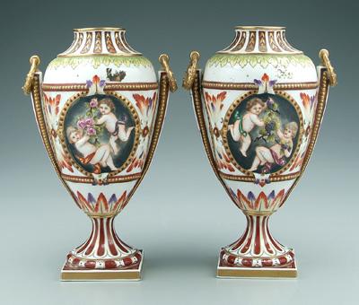 Pair porcelain vases putti frolicking 94426