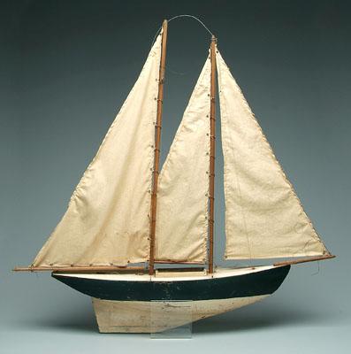 Two masted wooden boat model: display