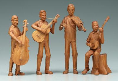 Four Wade Martin carvings, four musicians