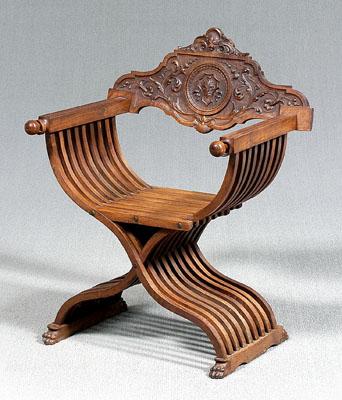 Carved walnut Savonarola chair,