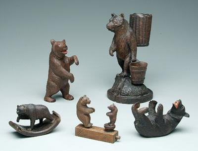 Five carved bear figures: standing