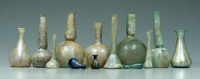 Twelve ancient Roman bottles pale 94a86