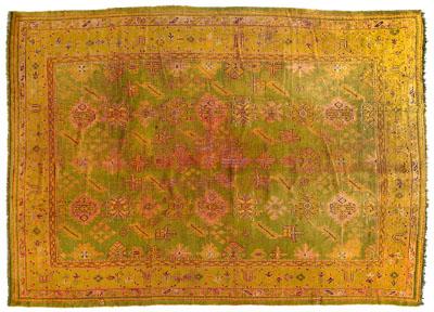 Oushak rug, repeating motifs on