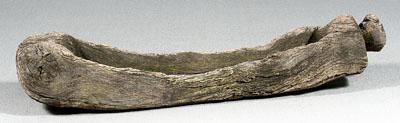 Carved oak trough, curved log form,