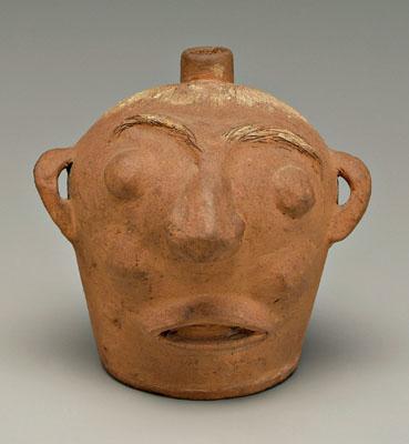 Charles Ferguson face jug, incised